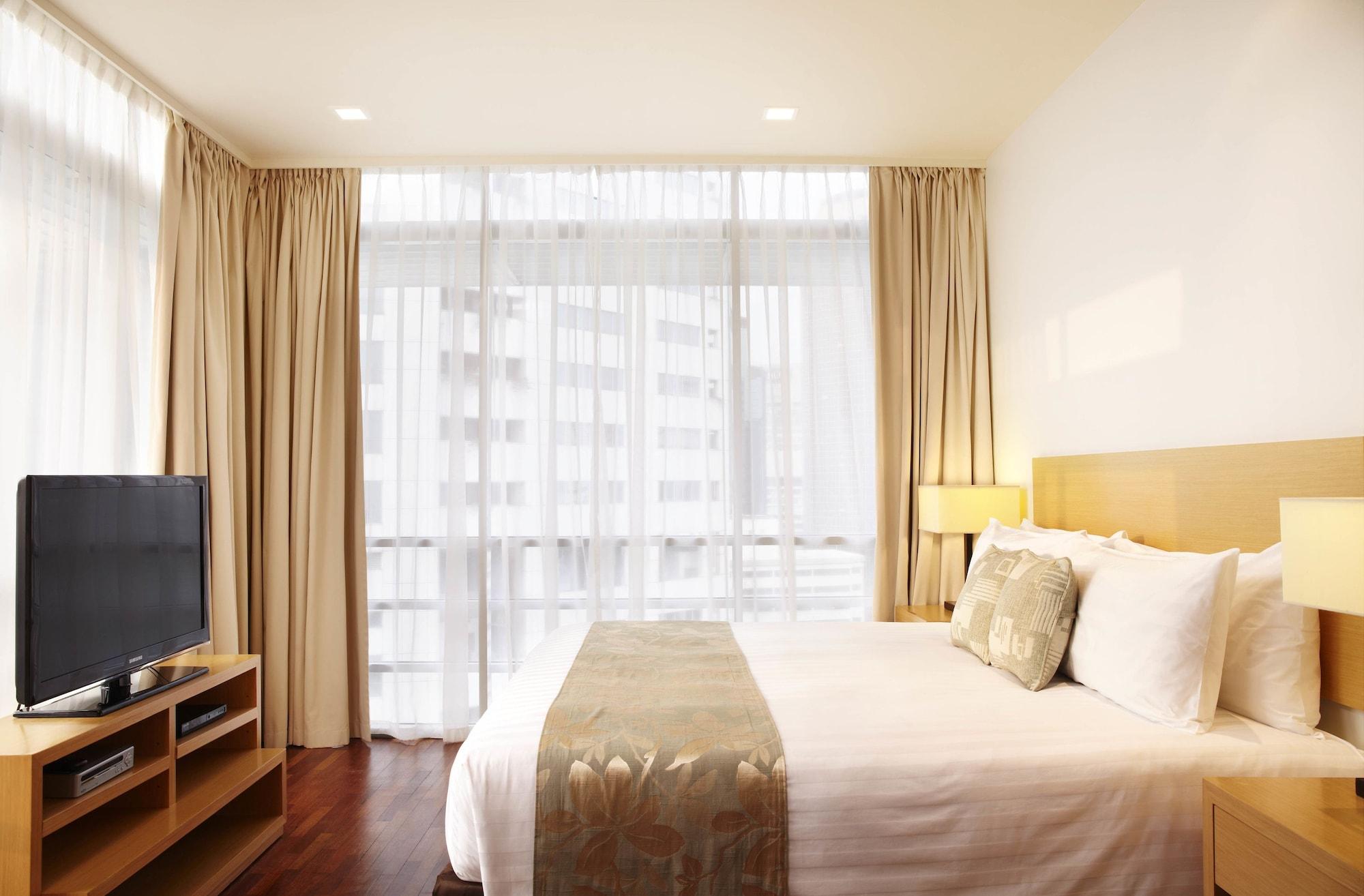 Parkroyal Serviced Suites Kuala Lumpur Exteriér fotografie A bedroom at the hotel