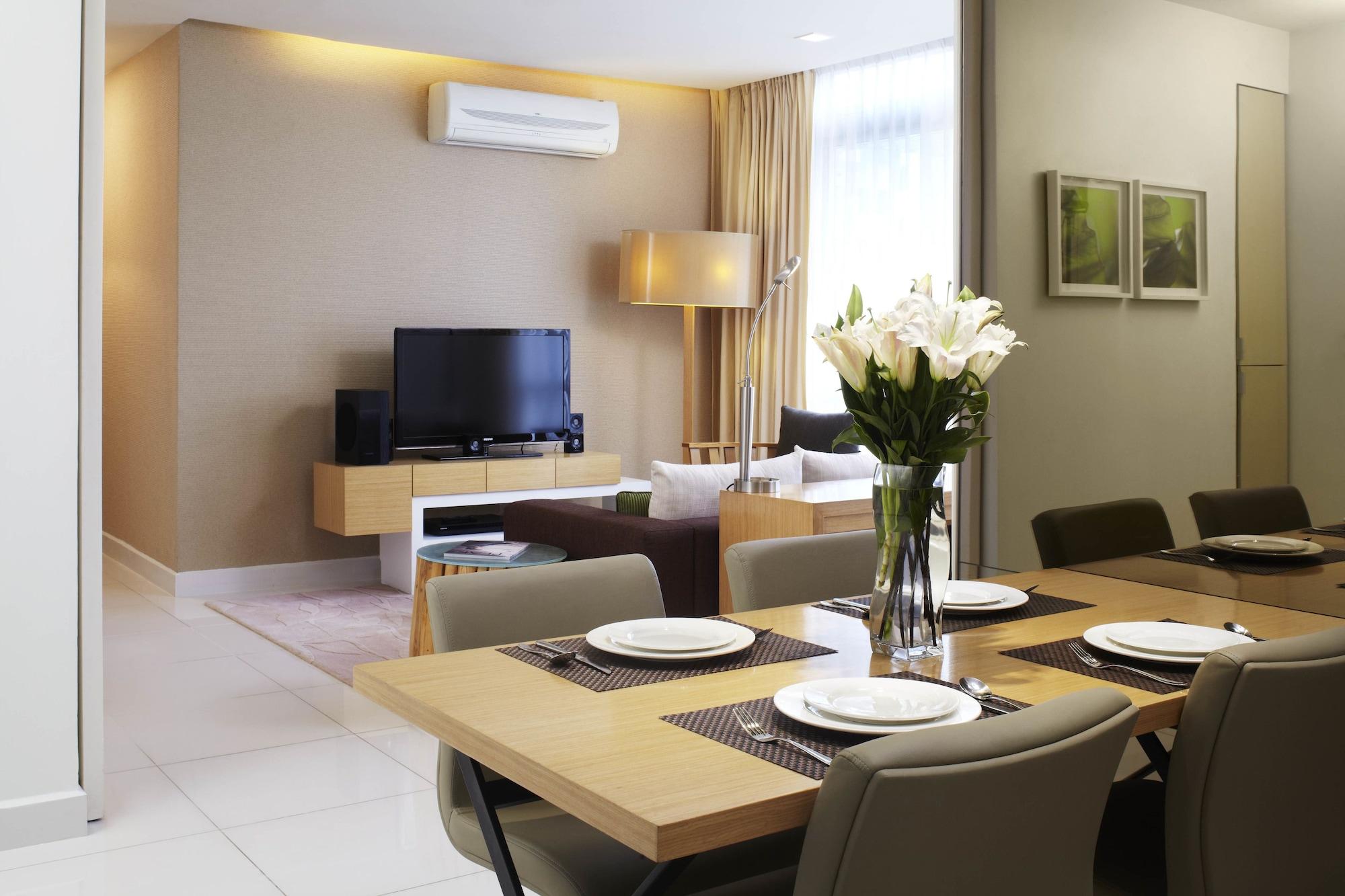 Parkroyal Serviced Suites Kuala Lumpur Exteriér fotografie A living room with a wall-mounted air conditioner