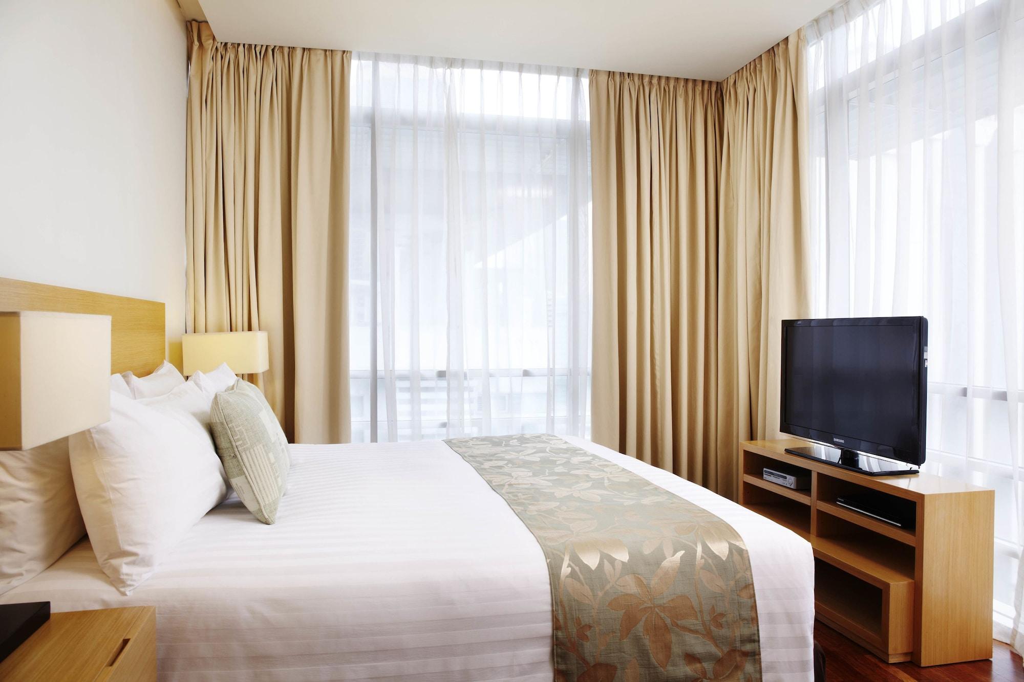 Parkroyal Serviced Suites Kuala Lumpur Exteriér fotografie A bedroom at the hotel