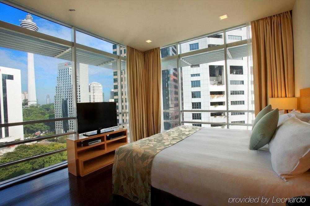 Parkroyal Serviced Suites Kuala Lumpur Pokoj fotografie A bedroom at the hotel